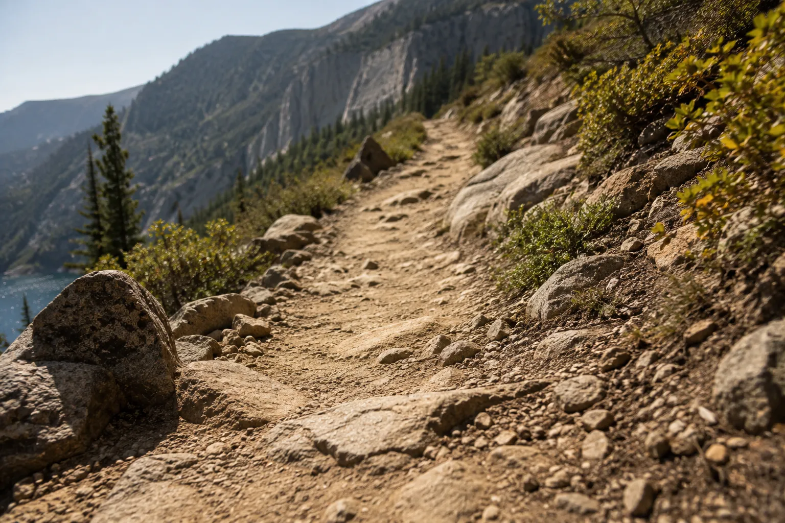 Rugged mountain trail symbolizing stepping outside your comfort zone, testing yourself, embracing challenge, and discovering your true potential.